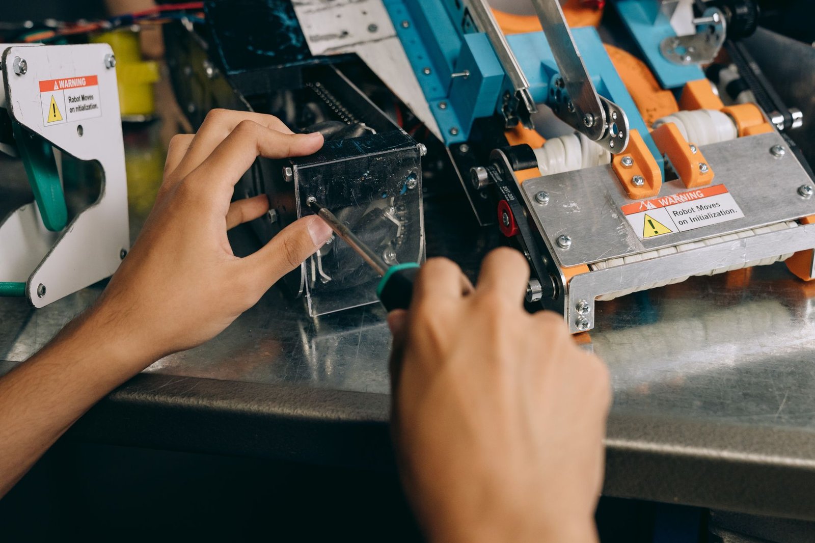 Engineer installing industrial equipment